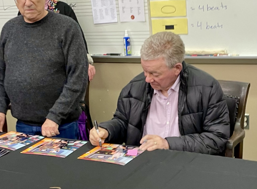 William Shatner signing an autograph 